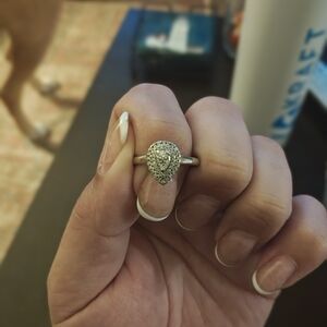 Elegant Platinum And Diamond Teardrop Ring